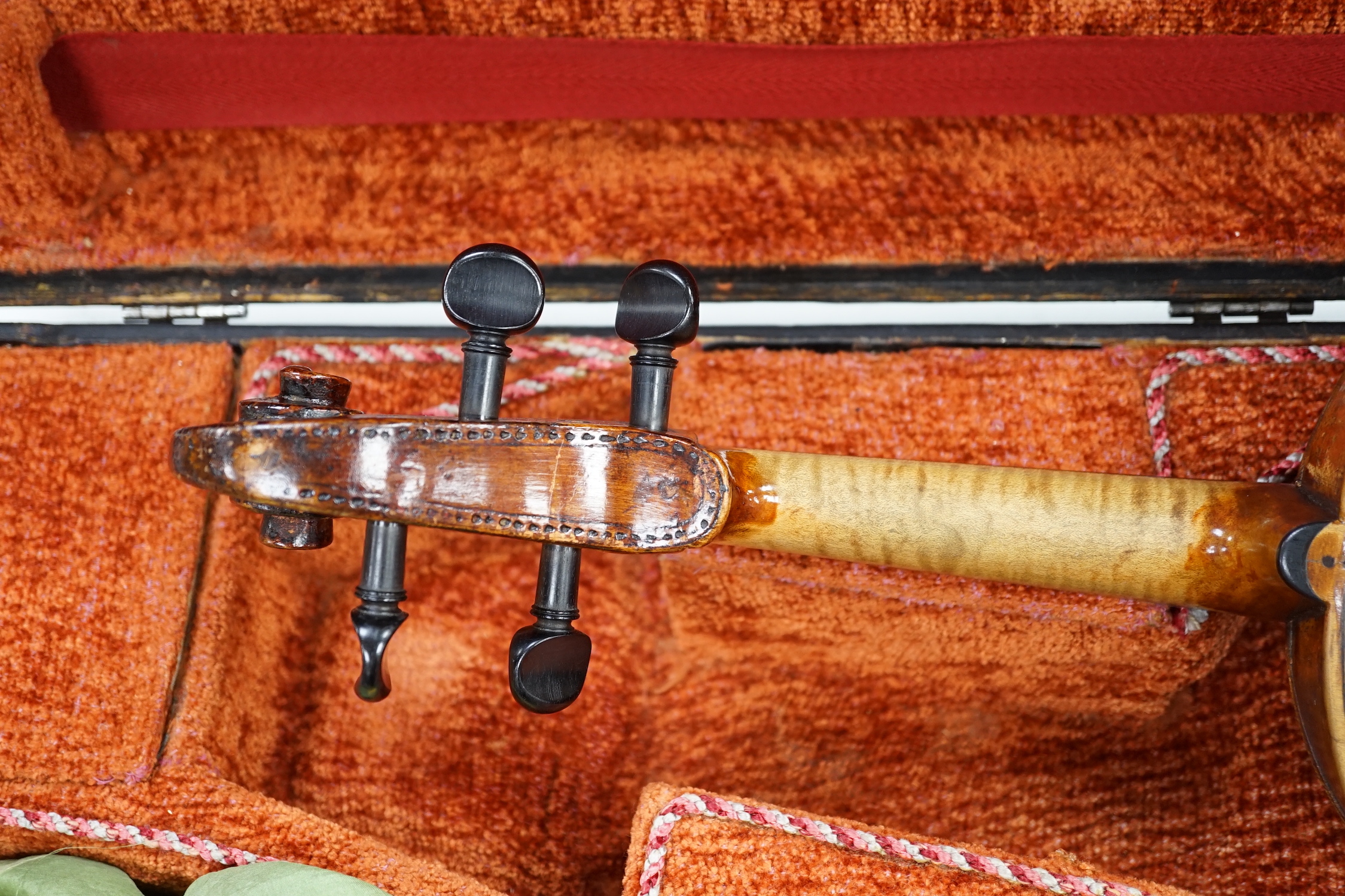 A cased 19th century German viola, length of body 39cm, in a good double case incorporating space for violin, without bow